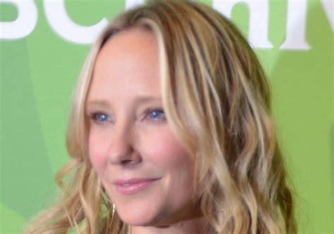 Anne Heche Stuns In Sizzling Swimsuit at Penthouse Pool